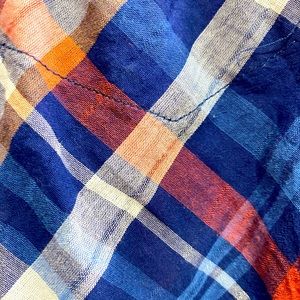 Plaid button down Maurice’s shirt thin  accent cuffs if rolled